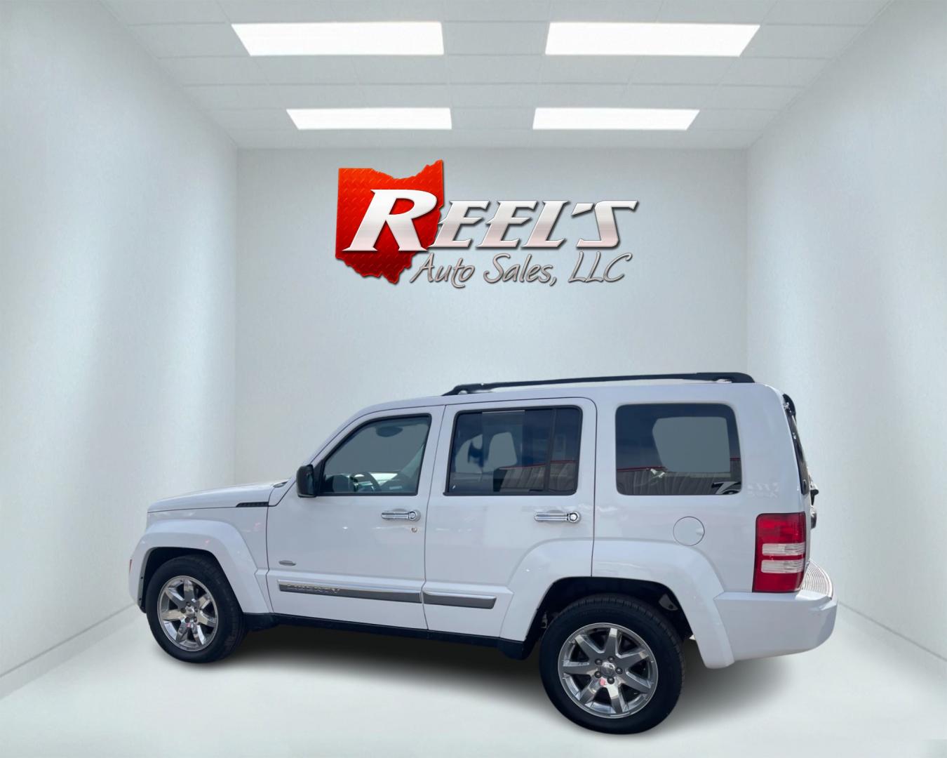 2012 White /Black Jeep Liberty Latitude 4WD (1C4PJMAK0CW) with an 3.7L V6 SOHC 12V engine, 4-Speed Automatic transmission, located at 547 E. Main St., Orwell, OH, 44076, (440) 437-5893, 41.535435, -80.847855 - Photo#13